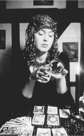 Predicting the future using a crystal ball and tarot cards. (PHILIP PANTON/FORTEAN  PICTURE LIBRARY)